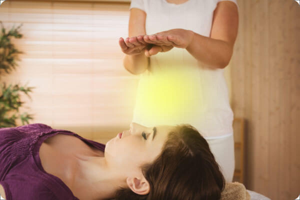 Therapist Conducting Distance Reiki Therapy